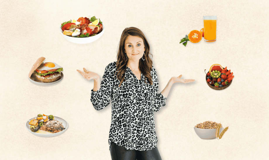 Dr. Heather surrounded with healthy foods